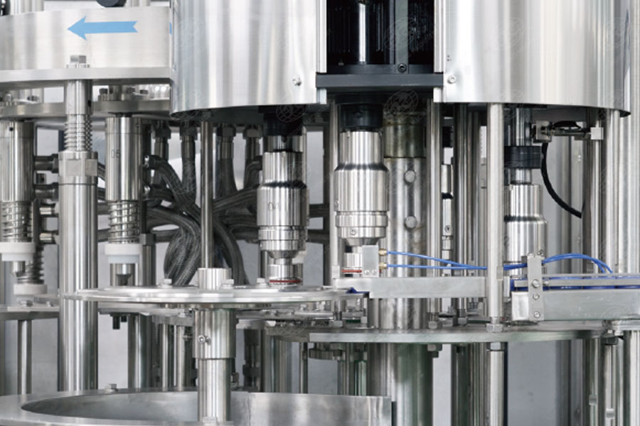 大瓶水灌裝機(jī)旋蓋部分 大瓶水灌裝機(jī)旋蓋部分